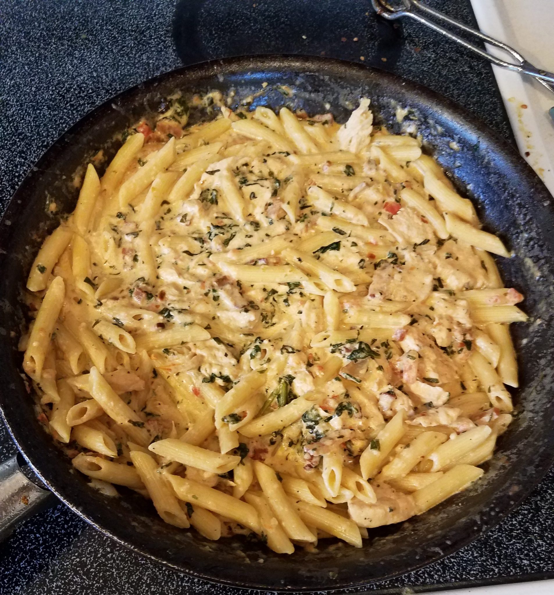 Chicken Bacon pasta with tomato Parmesan sauce